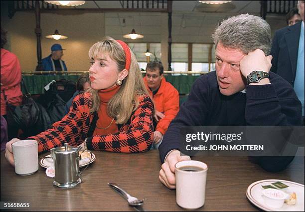 Democratic presidential candidate Bill Clinton in a picture dated 16 February 1992 in Bedford and his wife Hillary relax during campaign tour.