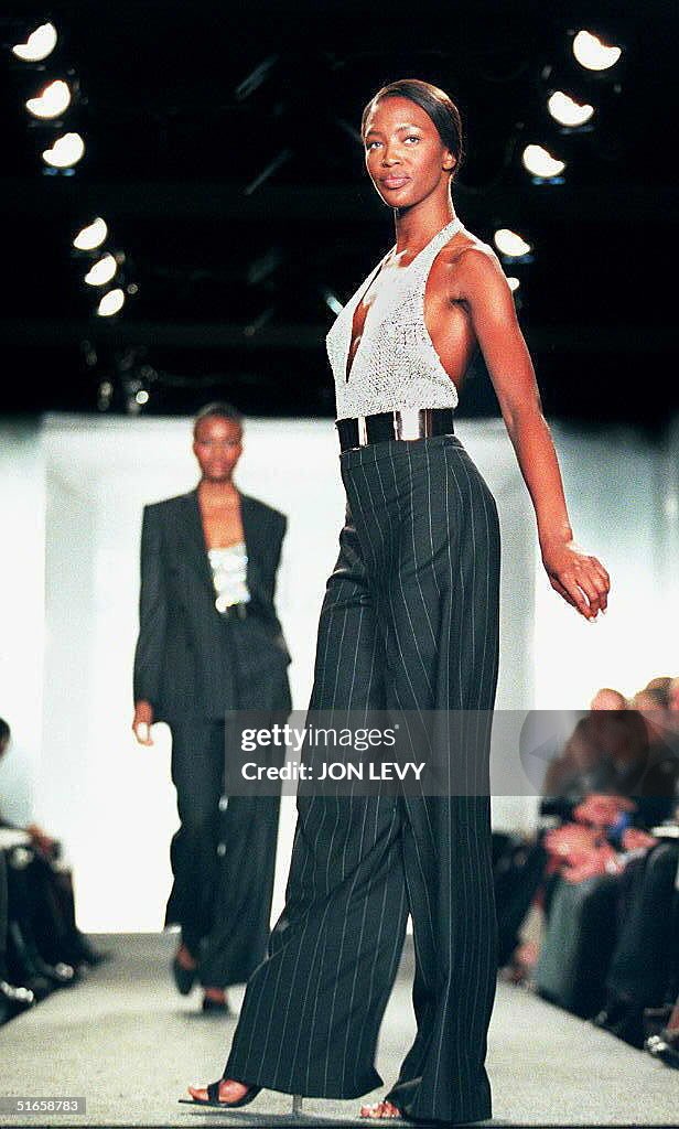 Model Naomi Campbell wears a sparkling backless to