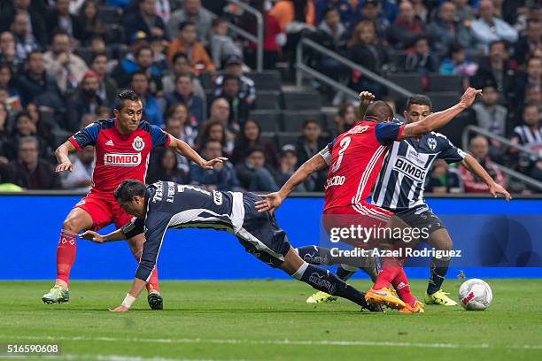 Rogelio Funes Mori of Monterrey falls to the ground during the 11th round match between Monterrey and Chivas as part of the Clausura 2016 Liga MX at...