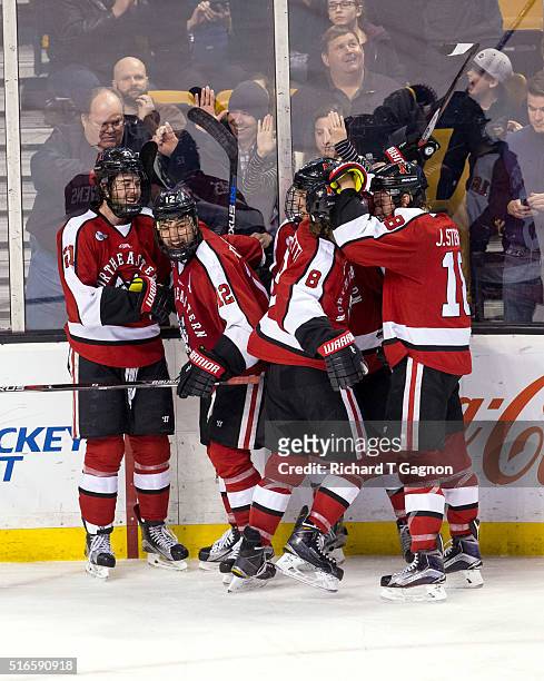Zach Aston-Reese of the Northeastern Huskies celebrates after scoring the eventual game-winning goal against the Massachusetts Lowell River Hawks...