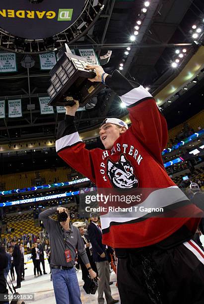 Adam Gaudette of the Northeastern Huskies celebrates a 3-2 victory against the Massachusetts Lowell River Hawks during NCAA hockey in the Hockey East...