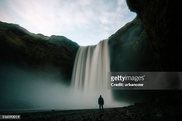 skogafoss silhouette at dusk - skogafoss waterfall stock pictures, royalty-free photos & images