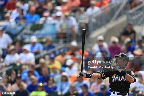 Ichiro Suzuki of the Miami Marlins prepares for an at bat during the spring training game against the New York Mets on March 15, 2016 in Jupiter,...