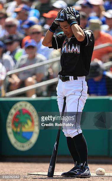 Ichiro Suzuki of the Miami Marlins prepares for an at bat during the spring training game against the New York Mets on March 15, 2016 in Jupiter,...