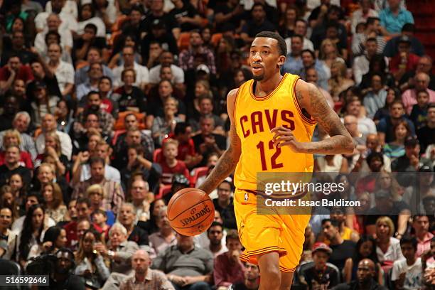 Jordan McRae of the Cleveland Cavaliers handles the ball against the Miami Heat on March 19, 2016 at AmericanAirlines Arena in Miami, Florida. NOTE...