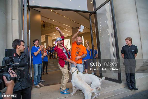 First day of the IPhone 6 and IPhone 6 Plus release in Spain with the firsts buyers in the Barcelona's city Apple Store. September 26th of 2014....