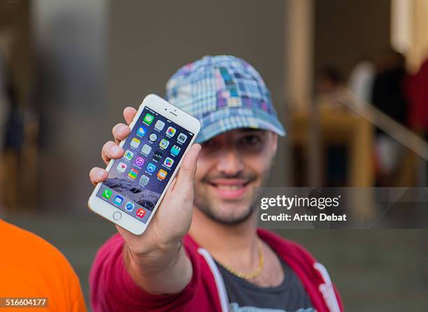 First day of the IPhone 6 and IPhone 6 Plus release in Spain with the firsts buyers in the Barcelona's city Apple Store. September 26th of 2014....