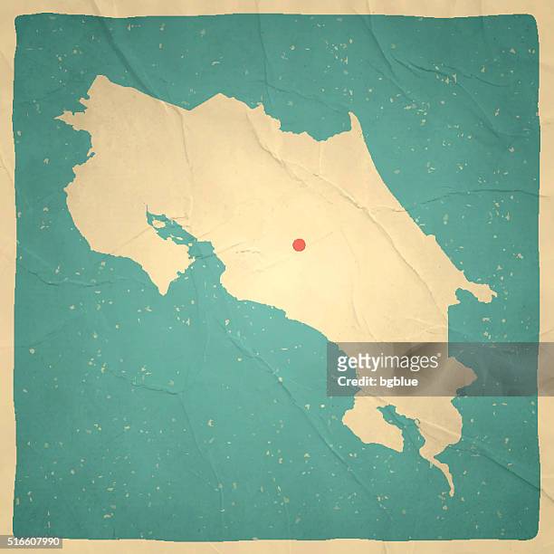 costa rica map on old paper - vintage texture - costa rica map stock illustrations