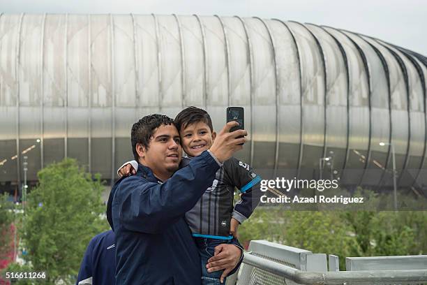 Father and his boy take a picture outside of the BBVA Stadium prior the 11th round match between Monterrey and Chivas as part of the Clausura 2016...