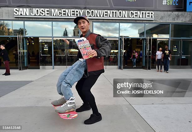 Dressed as Marty McFly from "Back to the Future 2", Edwin Fabian stands for a photo at the entrance to the Silicon Valley Comic Con in San Jose,...