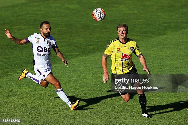 Ben Sigmund of the Phoenix controls the ball under pressure from Diego Castro of the Glory during the round 24 A-League match between the Wellington...