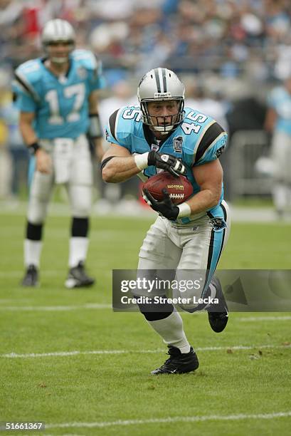 Brad Hoover of the Carolina Panthers carries the ball against the San Diego Chargers on October 24, 2004 at Bank of America Stadium in Charlotte,...