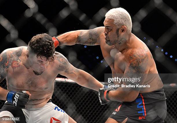 Mark Hunt delivers the knock out punch against Frank Mir during their UFC Heavyweight Bout at UFC Brisbane on March 20, 2016 in Brisbane, Australia.