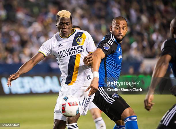 Gyasi Zerdes of Los Angeles Galaxy and Victor Bernardez of San Jose Earthquakes battle for the ball during Los Angeles Galaxy's MLS match against San...