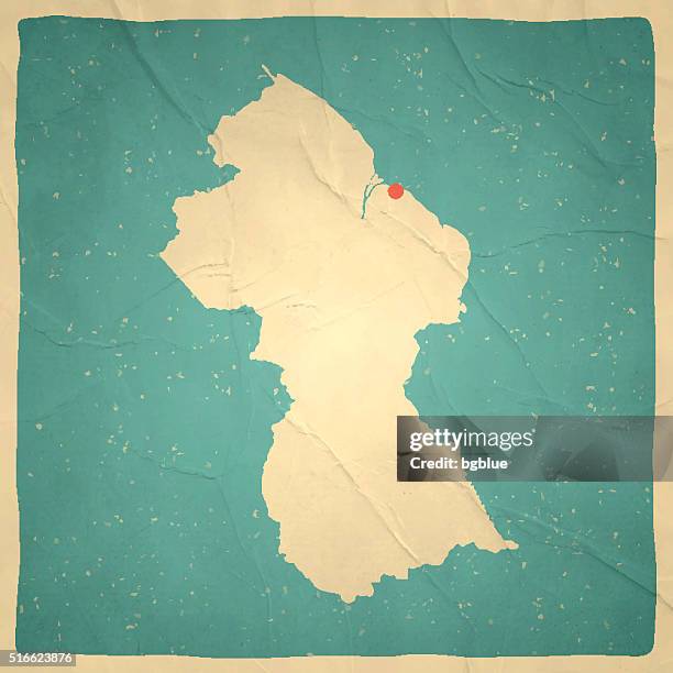 guyana map on old paper - vintage texture - georgetown stock illustrations