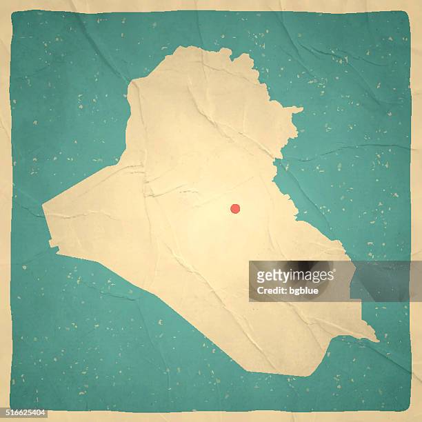 iraq map on old paper - vintage texture - iraq stock illustrations