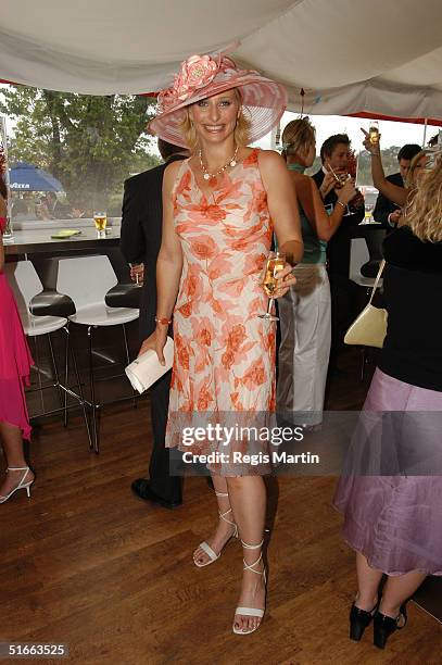 Johanna Griggs Wearing a dress by Jane Camortonand a hat by Neil Grigg during Crown Oaks Day at Flemington Racecourse November 4, 2004 in Melbourne,...