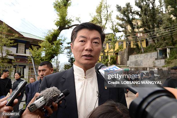 Sikyong of the Central Tibetan Administration Lobsang Sangay, interacts with media representatives after casting his vote in leadership elections in...