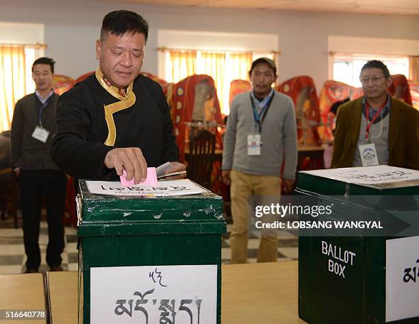 Candidate for Sikyong Penpa Tsering casts his vote in leadership elections in Dharamshala on March 20, 2016. Tens of thousands of exiled Tibetans...