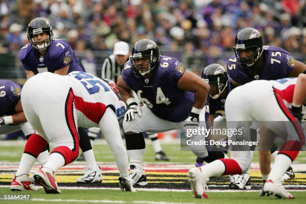 Kyle Boller, Edwin Mulitalo and Jonathan Ogden of the Baltimore Ravens line up against the Buffalo Bills defense at M&T Bank Stadium on October 24,...