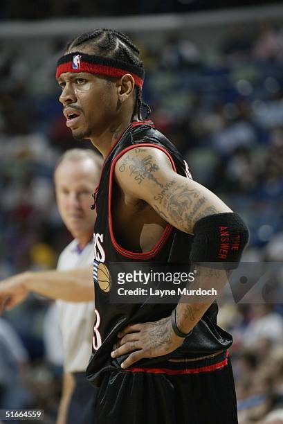 Allen Iverson of the Philadelphia 76ers stands on the court during the preseason game with the New Orleans Hornets at New Orleans Arena on October...