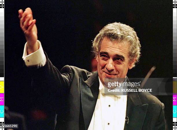 Spanish tenor Placido Domingo acknowledges a standing ovation 12 December after performing at the Royal Opera House to celebrate the 25th anniversary...