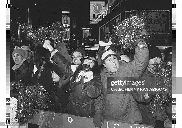 Despite frigid temperatures, a crowd which is expected to swell to 500,000 began to gather early in Times Square to celebrate New Year's Eve 31...