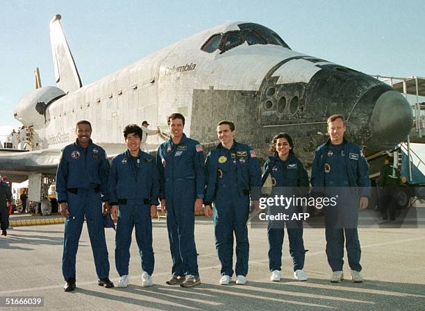 The crew of the space shuttle Columbia Winston Scott of the US, Takao Doi of Japan, mission Commander Kevin Kregel of the US, Leonid Kadenyuk of...