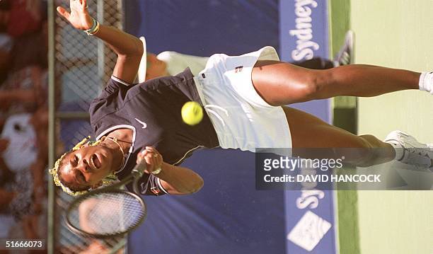 American teenager Serena Williams in action against Italian Laura Golarsa at the Sydney international 11 January. Both Serena and her sister Venus...