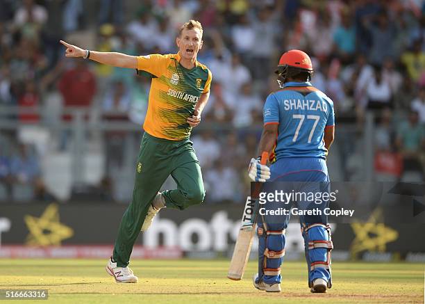 Chris Morris of South Africa celebrates dismissing Mohammad Shahzad of Afghanistan during the ICC World Twenty20 India 2016 Super 10s Group 1 match...