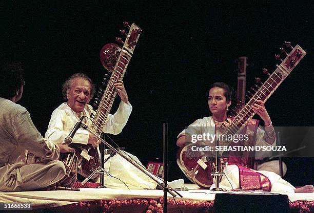 World renown sitar mestro Ravi Shankar and his 18 year-old daughter Anoushka, perform at the Aalaap music festival in central Bombay late 27...