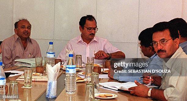 Jaywant Lele , secretary of the Board of Cricket Control in India, Ajit Wadekar , chairman selection committee, and Madan Lal attend a meeting of...