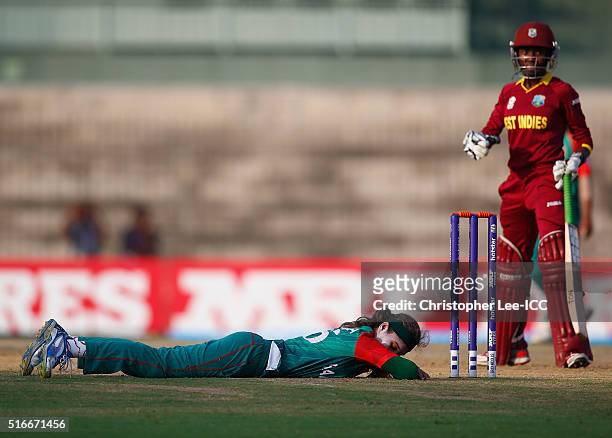 Jahanara Alam, Captain of Bangladesh nearly runs out Stacy-Ann King of the West Indies during the Women's ICC World Twenty20 India 2016 Group B match...