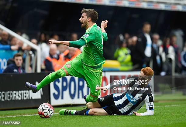 Fabio Borini of Sunderland is challenged by Jack Colback of Newcastle United during the Barclays Premier League match between Newcastle United and...