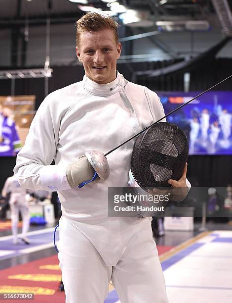 In this handout image provided by the FIE, Bas Verwijlen of Netherlands competes during the individual men's epee match and qualifies for the Rio...