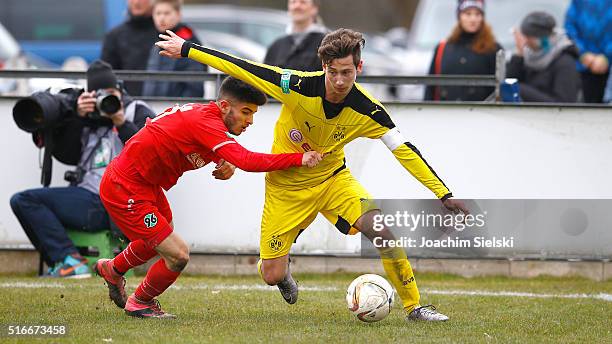 Mete Kaan Demir of Hanover challenges Till Schumacher of Dortmund during the DFB Juniors Cup Semi Final match between Hannover 96 and Borussia...