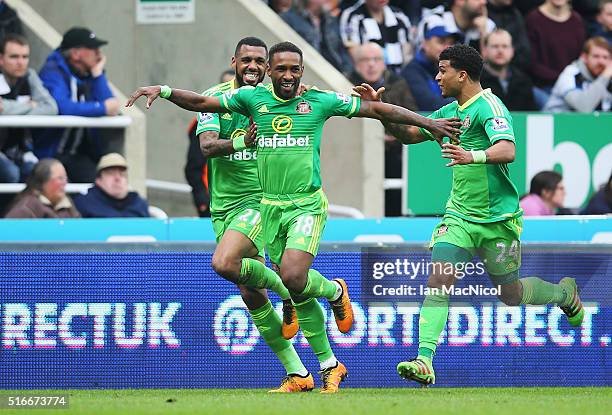 Jermain Defoe of Sunderland celebrates with Yann M'Vila and DeAndre Yedlin as he scores their first goal during the Barclays Premier League match...