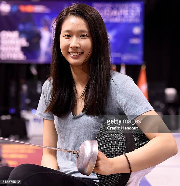In this handout image provided by the FIE, Man Wai Vivian Kong of Hong Kong competes during the individual women's epee match and qualifies for the...