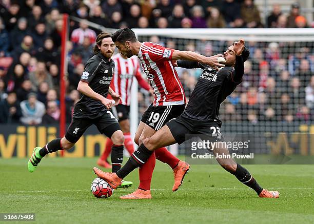 Emre Can of Liverpool competes with Graziano Pelle of Southampton during the Barclays Premier League match between Southampton and Liverpool at St...