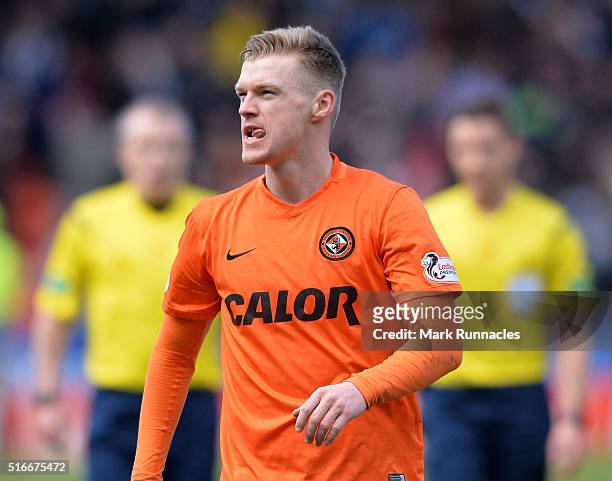 Dundee United's Billy McKay applauds the Dundee United fans as he walk from the pitch after scoring two goal during the Ladbrokes Scottish...