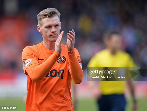 Dundee United's Billy McKay applauds the Dundee United fans as he walk from the pitch after scoring two goal during the Ladbrokes Scottish...