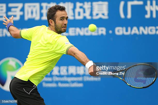 Marsel Ilhan of Turkey returns a shot during the match against Lukas Lacko of Slovakia during the 2016 "GDD CUP" International ATP Challenger...