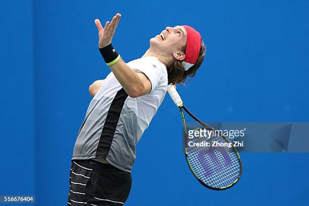 Lukas Lacko of Slovakia serves during the match against Marsel Ilhan of Turkey during the 2016 "GDD CUP" International ATP Challenger Guangzhou Tour...