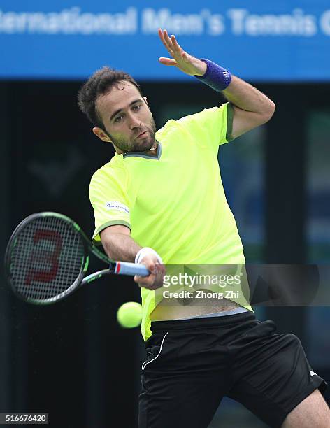 Marsel Ilhan of Turkey returns a shot during the match against Lukas Lacko of Slovakia during the 2016 "GDD CUP" International ATP Challenger...