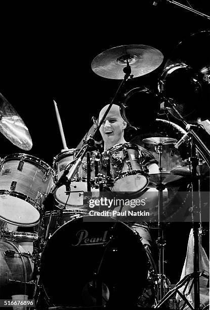 British musician Chris Slade, of rock group the Firm, plays drums as he performs onstage at the Milwaukee Arena, Milwaukee, Wisconsin, March 7, 1985.