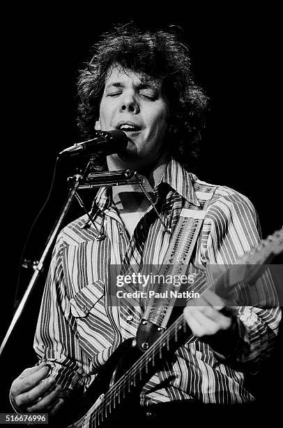 American Folk and Pop musician Steve Forbert plays guitar as he performs onstage at the Park West Auditorium, Chicago, Illinois, November 16, 1979.