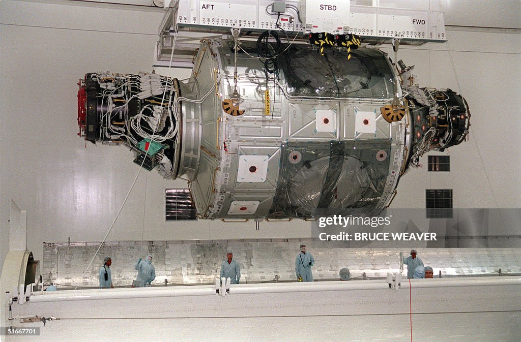 Unity Module Nasa Technicians wait to receive the Unity module of the International ...