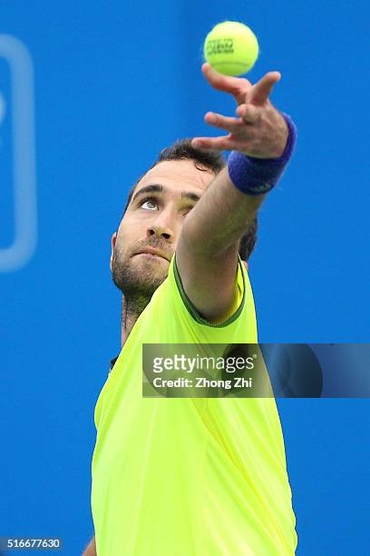 Marsel Ilhan of Turkey serves during the match against Lukas Lacko of Slovakia during the 2016 "GDD CUP" International ATP Challenger Guangzhou Tour...
