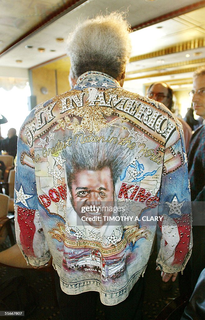 Boxing promoter Don King shows off his "Only In Am