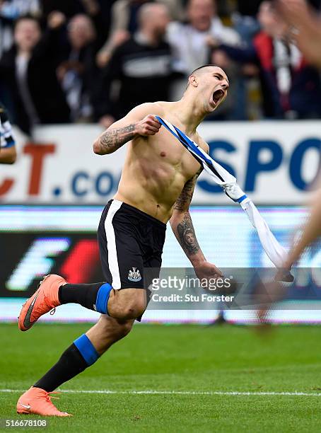 Aleksandar Mitrovic of Newcastle United celebrates after scoring their first and equalising goal during the Barclays Premier League match between...